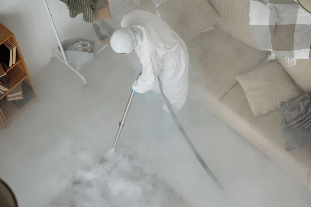 Biohazard cleanup technician in protective equipment, Westhaven, Memphis, TN